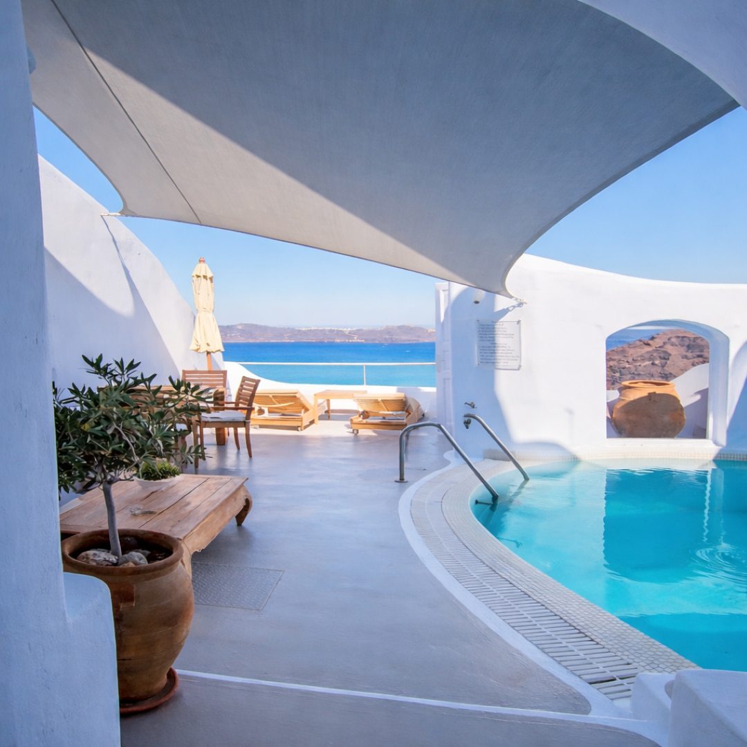 Private pool terrace with caldera views at Ikastikies Suites Santorini